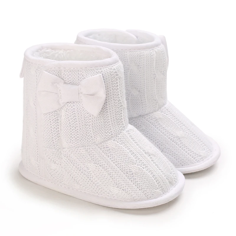 Chaussons bébé en laine avec nœud papion